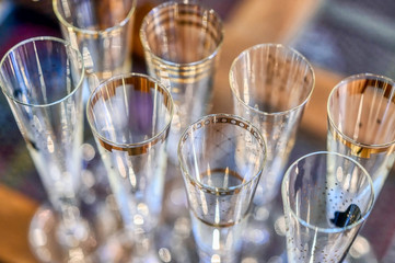 Celebrating with champagne and champagne flute glasses 