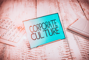 Writing note showing Corporate Culture. Business concept for pervasive values and attitudes that...