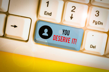 Word writing text You Deserve It. Business photo showcasing should have it because of their qualities or actions White pc keyboard with empty note paper above white background key copy space