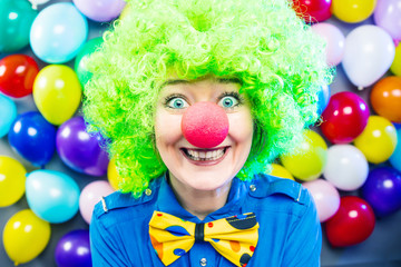 Portrait of beautiful party woman in wig and glasses (Carneval).