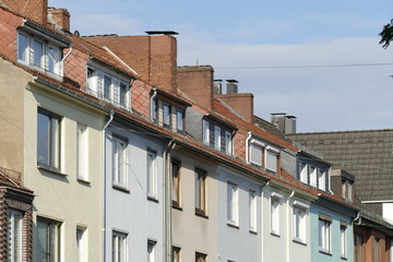 Fototapeta na wymiar Moderne monotone Wohngebäude, Mietshäuser, Reihenhäuser, Mehrfamilienhäuser, Bremen, Deutschland