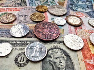 background of various metal coins, paper money and banknotes of different countries of the world