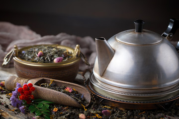 Dried leaf tea on old background
