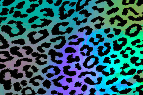Seamless abstract background of blue, green, purple and black animal print 
