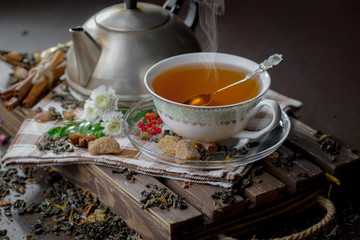 Tea in a cup on an old background