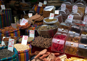 Fototapeta na wymiar Spices and dried fruit in a market