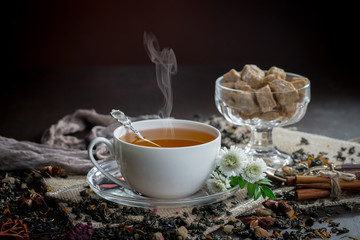 Tea in a cup on an old background