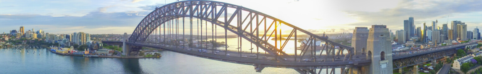 Sydney Harbour Bridge at dusk. Panoramic aerial view from drone
