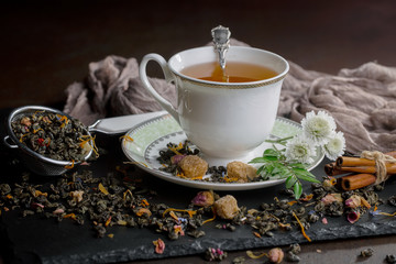 Tea in a cup on an old background