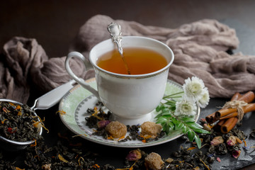 Tea in a cup on an old background