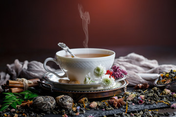 Tea in a cup on an old background