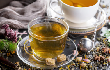 Tea in a cup on an old background