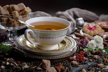 Tea in a cup on an old background