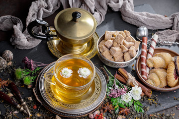 Tea in a cup on an old background