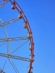 Part of observation wheel with few empty cabins