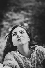 girl in a white dress on a mist field with oaks
