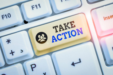 Conceptual hand writing showing Take Action. Concept meaning to do something To act in order to get...