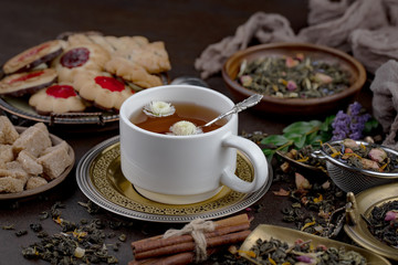 Tea in a cup on an old background