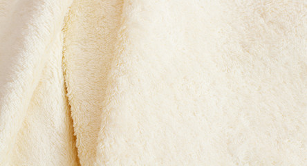 Closeup white towel banner background. Top view and mock up fluffy shower towels texture. Template blank copy space. Flat lay. Selective focus