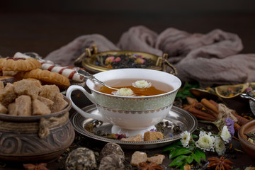 Tea in a cup on an old background