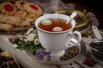 Tea in a cup on an old background