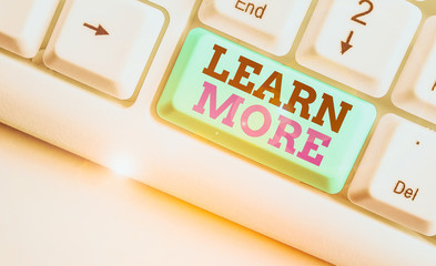 Word writing text Learn More. Business photo showcasing to get knowledge or skill in a new subjects...