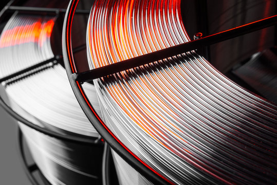 welding wire, stainless steel, on a black background