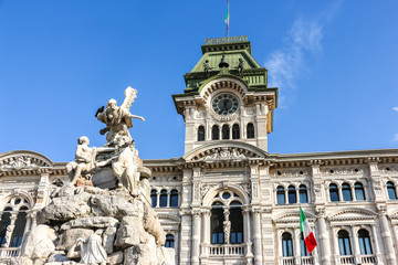 Fototapeta na wymiar Trieste, Italy. View of Comune di Trieste building in sunny day.