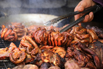Grilled pork intestines and grilled meat at the New Year's celebration