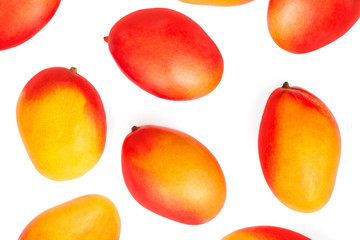 Creative layout made of mango fruit. Tropical abstract background. Isolated mango. Flat lay. Food...