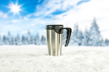 snow background and thermos with landscape of mountains. 