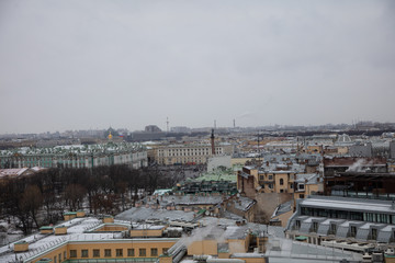 Beautiful view of St. Petersburg from the observation deck of St. Isaac's Cathedral on a blue cloudy day.
