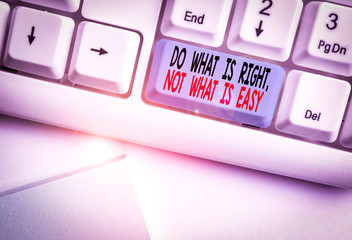 Writing note showing Do What Is Right Not What Is Easy. Business concept for willing to stand up...
