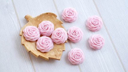 Pink flower DIY project made out of fabric or cloth. These handmade flowers with rose  pink color are great for handicraft project.