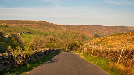 Driving on the B6270 road near Keld, North Yorkshire, England, UK