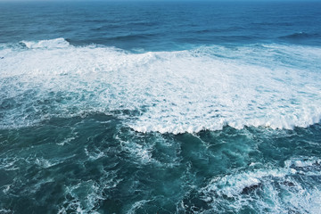 Fototapeta na wymiar Stormy sea with big waves close-up. Turquoise