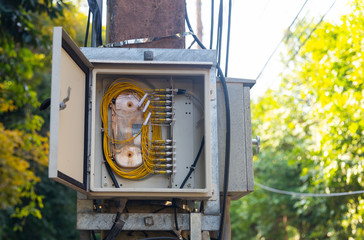 Splitter fiber optic box on a power pole.
