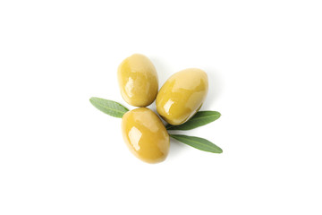 Tasty green olives and leaves isolated on white background, top view
