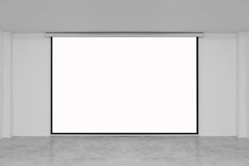 lecture room with empty white projector screen