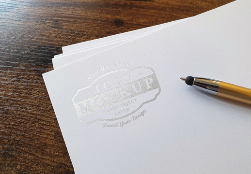 Debossed Shiny Logo Mockup on Paper Stack