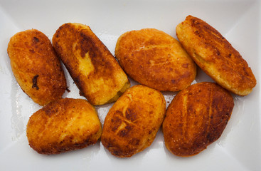 romanian cheese donuts on plate. traditional food