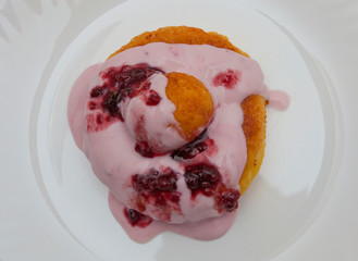 romanian cheese donuts with yoghurt and raspberry jam. traditional food