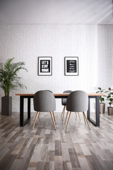 Modern dining room interior with stylish furniture