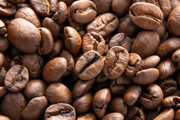 Roasted coffee beans closeup. Background. Coffee texture
