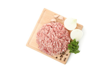 Cutting board with minced meat and spices isolated on white background