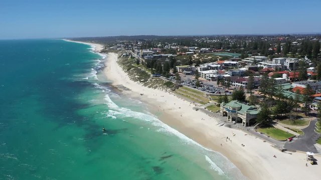 4k Smooth drone footage over beautiful Cottesloe beach in Fremantle, Perth Australia on a warm summer day