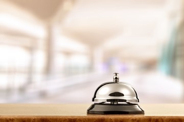 Hotel ring on wooden blur background.