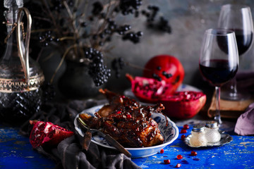 quail in pomegranate sauce. rustic photo
