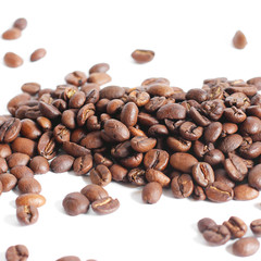 Coffee beans. Coffee beans on a white background. Brown