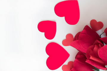 Romantic red color and valentines hearts symbolize a greeting of love .